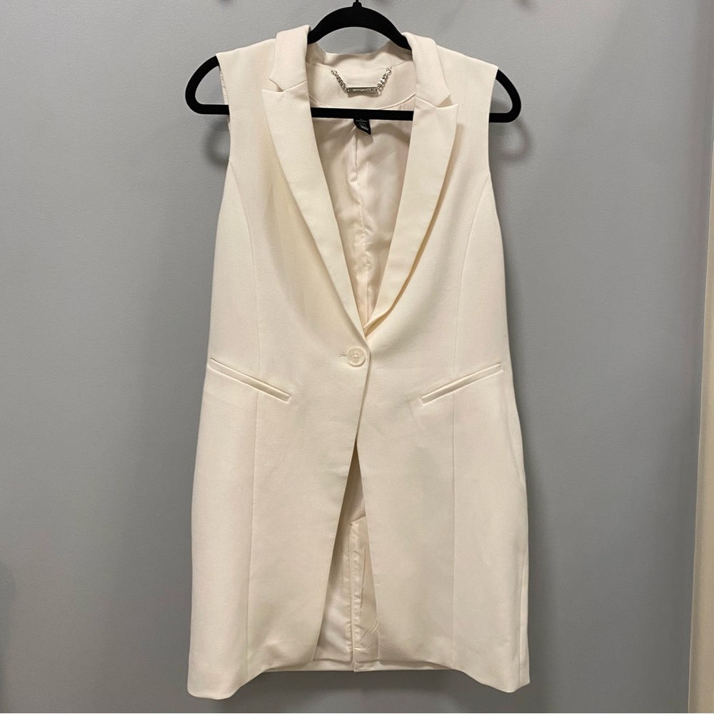 White House Black Market woman’s dressy, cream long jacket